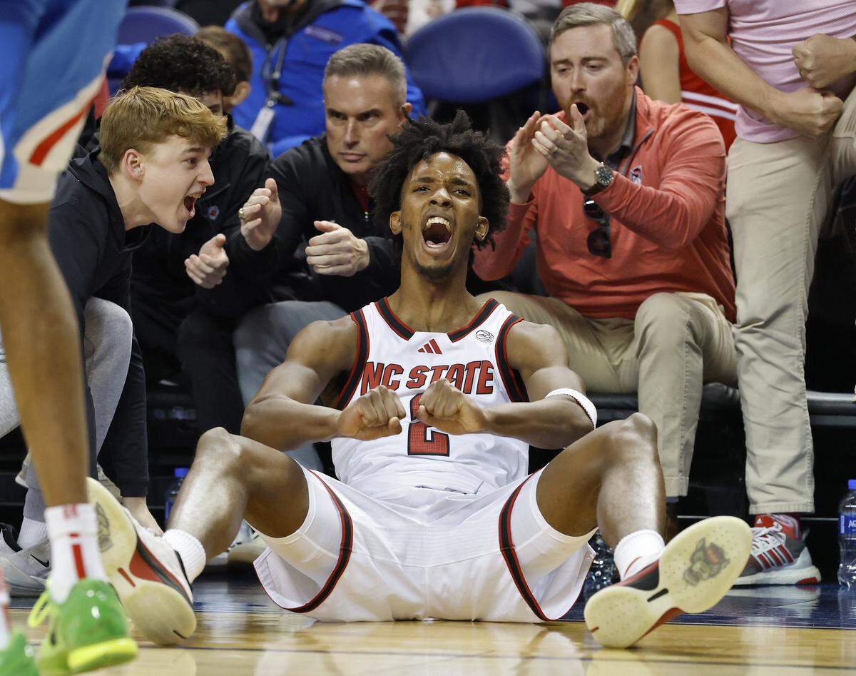N.C. State’s Paul McNeil Jr. reacts after drawing a foul during the second half of the Wolfpack’s 76-62 win over Ole Miss on Sunday, Dec. 21, 2025, at First Horizon Coliseum in Greensboro, N.C.