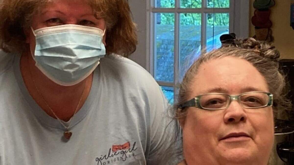 Home health nurse Michelle Crance, left, with patient Penny.