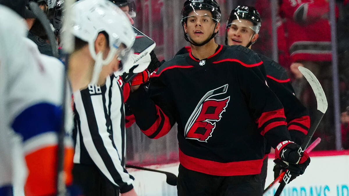 Carolina Hurricanes center Jesperi Kotkaniemi (82) celebrates his goal against the New York Islanders during the second period at PNC Arena.