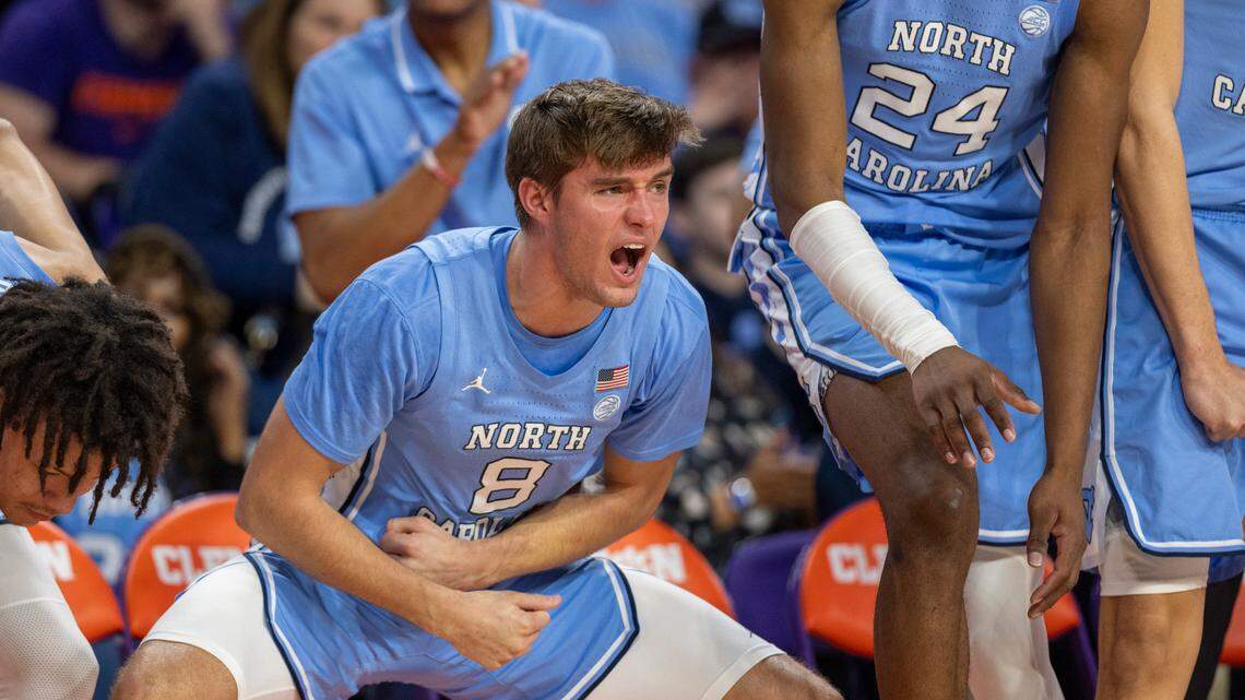North Carolina’s Paxson Wojcik (8) reacts on the Tar Heels’ bench after Armando Bacot drew a blocking foul on Clemson’s P.J. Hall (24) in the second half on Saturday, January 6, 2024 at Littlejohn Coliseum in Clemson, S.C.