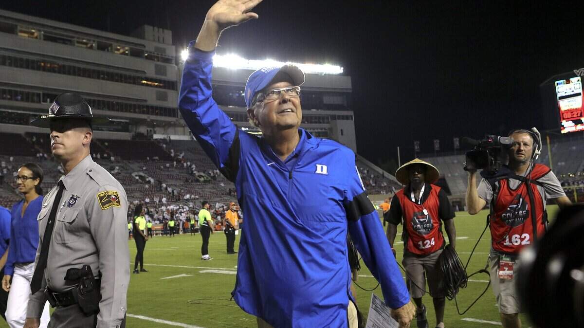 Duke head football coach David Cutcliffe waves to fans after a 45-10 NCAA college football game victory over Virginia Tech, Friday, Sept. 27, 2019, in Blacksburg, Va.