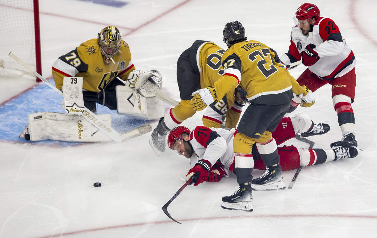 Carolina Hurricanes left wing Taylor Hall (71) is tripped by Vegas defenseman Shea Theodore (27) in the first period of Game 4 of the Stanley Cup Final, on Tuesday, June 9, 2026 in Las Vegas, NV.