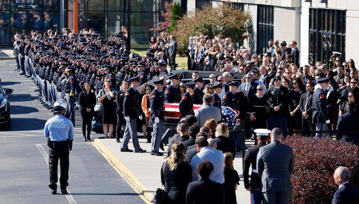 The casket of Raleigh Police Officer Gabriel Torres is brought into Cross Assembly Church in Raleigh, N.C. during his funeral Saturday, Oct. 22, 2022. Officer Torres was killed during a mass shooting Oct. 13.