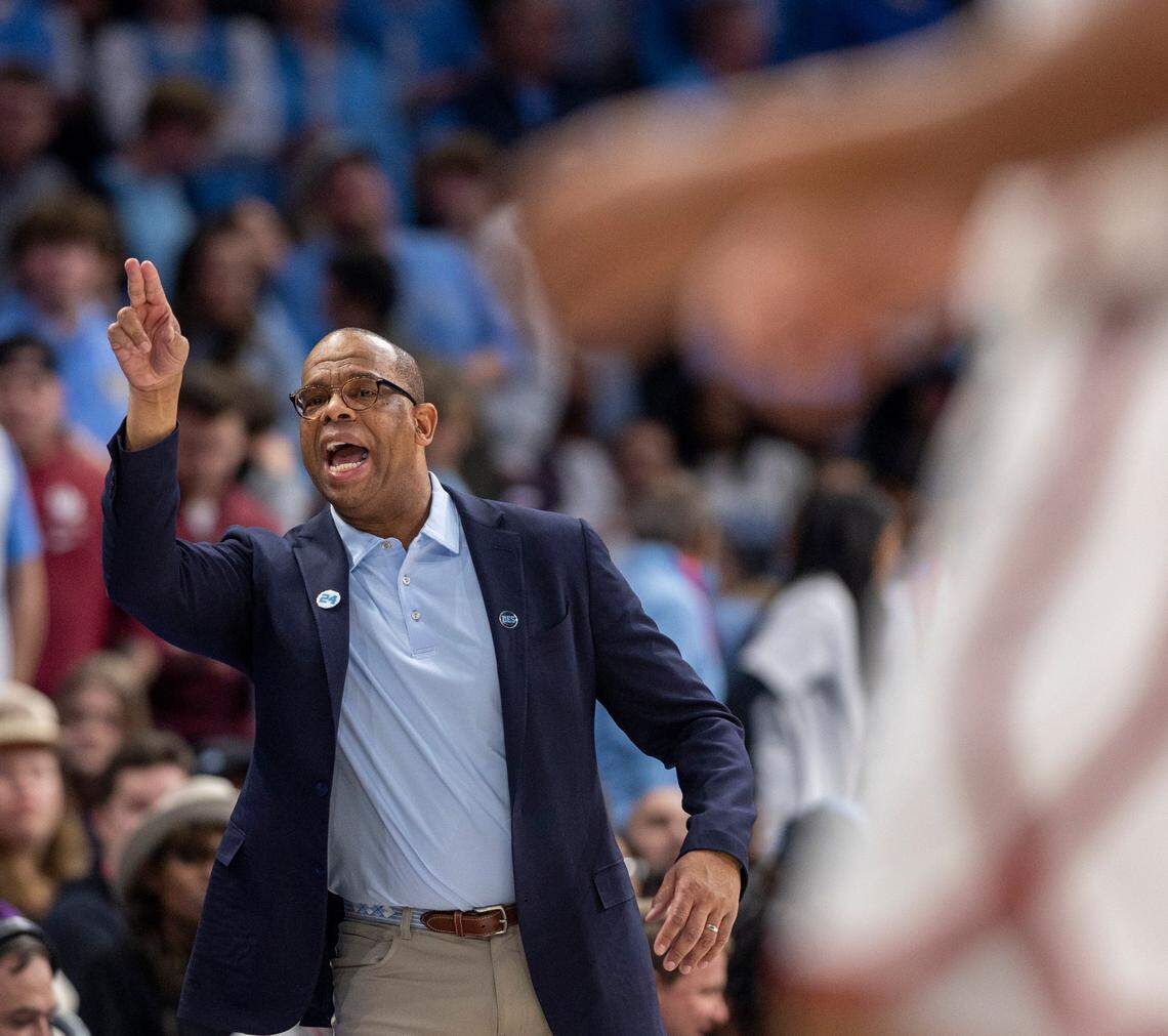 North Carolina coach Hubert Davis directs his team on defense in the second half against Oklahoma on Wednesday, December 20, 2023 at the Spectrum Center in Charlotte, N.C.
