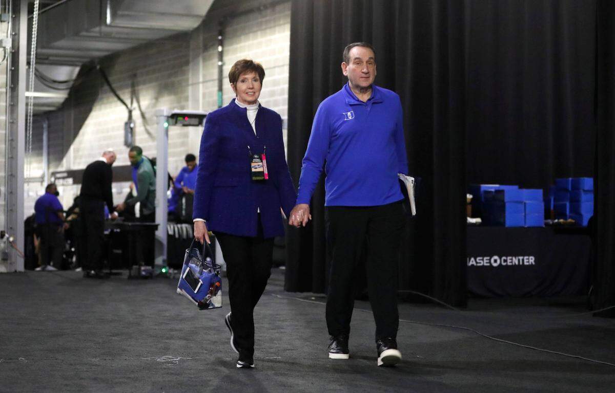 Duke head coach Mike Krzyzewski and his wife Mickie walk into the Chase Center in San Francisco, Calif., before Dukes game against Texas Tech in the Sweet 16 round of the NCAA Tournament Thursday, March 24, 2022.