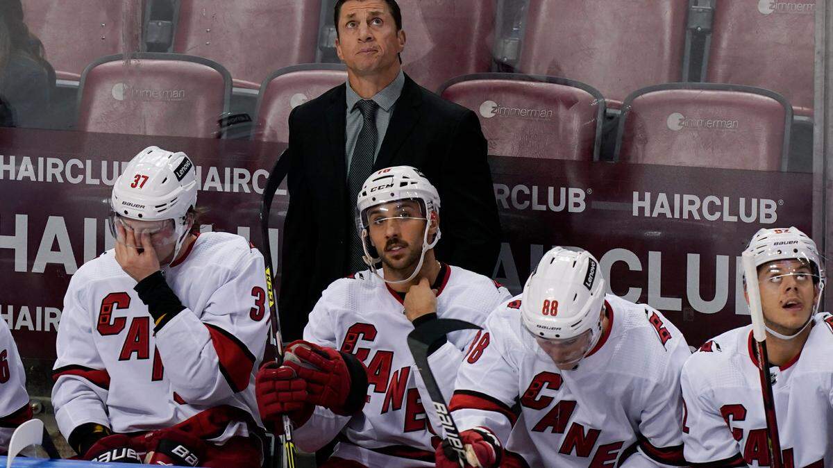 Carolina Hurricanes head coach Rod Brind’ Amour looks up during the third period at an NHL hockey game against the Florida Panthers, Saturday, Nov. 6, 2021, in Sunrise, Fla. The Panthers defeated the Hurricanes 5-2. (AP Photo/Marta Lavandier)