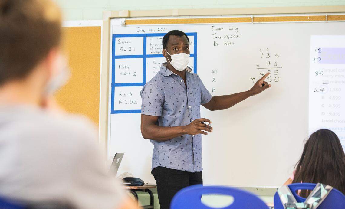 Ewan Lilly, a fifth grade teacher at Eno Valley Elementary School in Durham, N.C., conducts a math lesson during the “Camp Eno Valley” summer learning program on Monday, June 21, 2021.