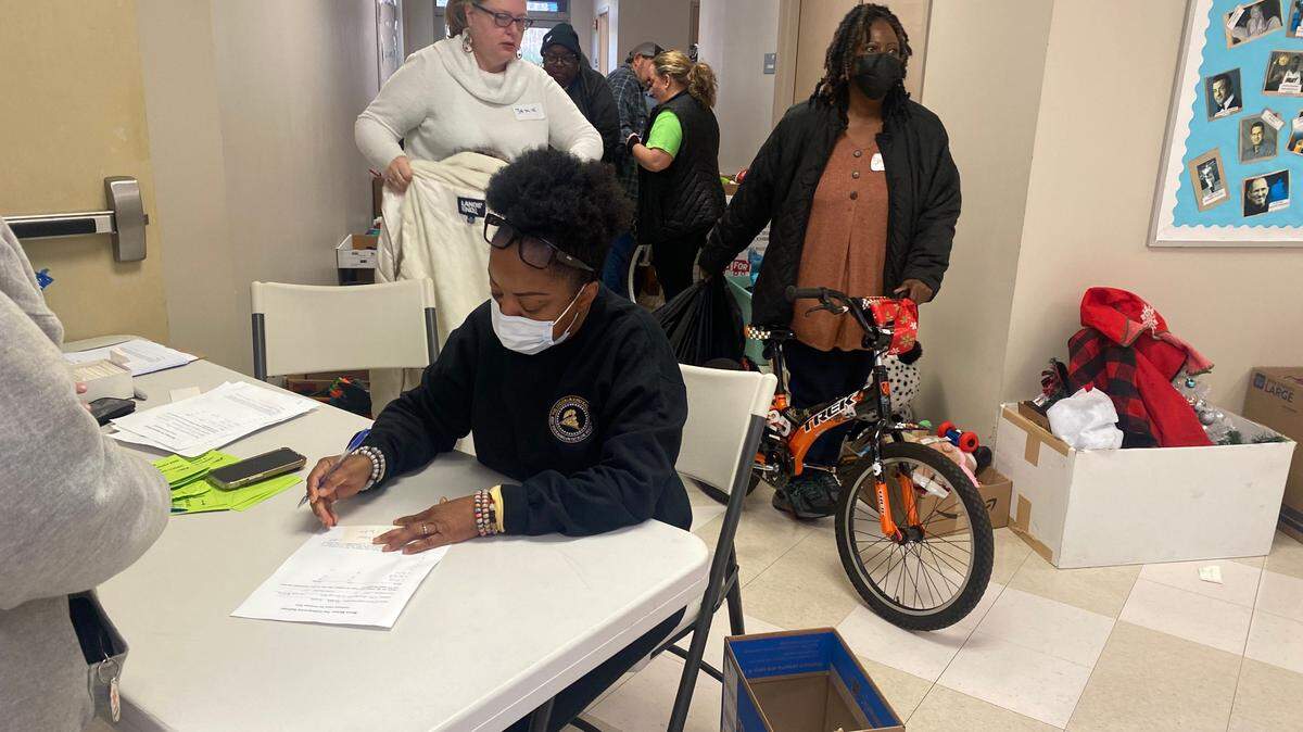 Melanie Stewart, aka “Mama Moses,” arranged for 180 bicycles to be given to needy families in Harnett County Saturday, part of her ongoing ministry.
