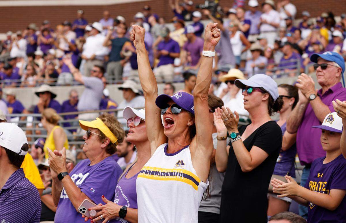 East Carolina fans celebrate during ECUs 13-7 victory over Texas in the Greenville Super Regional at Clark-LeClair Stadium Friday, June 10, 2022.