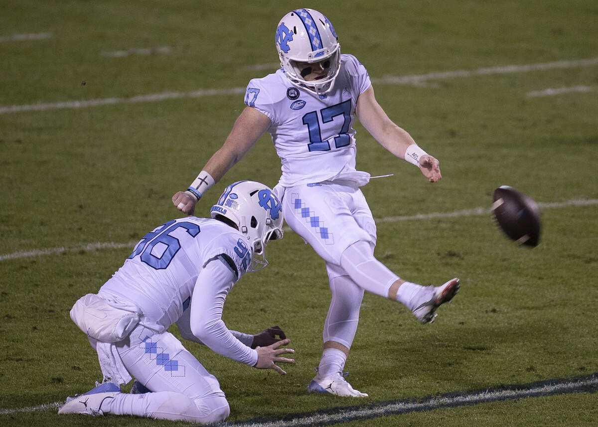 North Carolina kicker Grayson Atkins (17) boots a 30-yard field goal in the second quarter against Virginia on Saturday, October 31, 2020 at Scott Stadium in Charlottesville, Va.