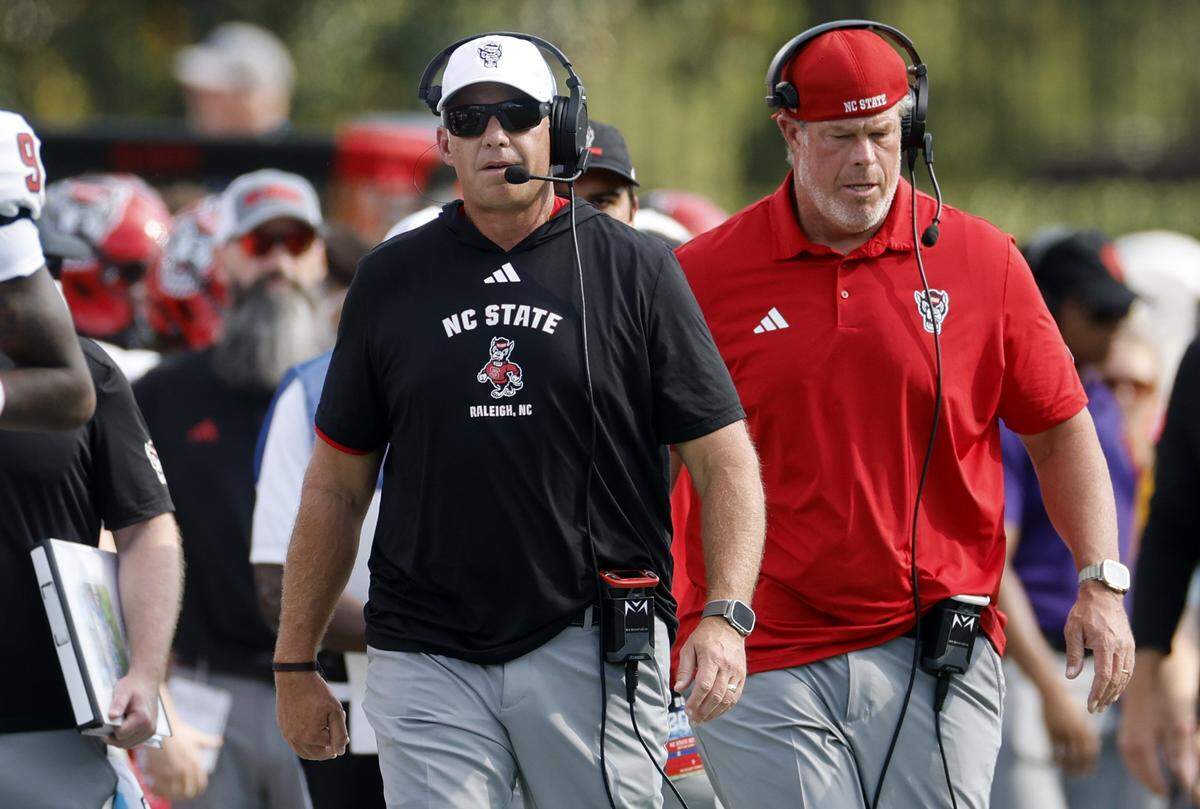N.C. State head coach Dave Doeren walks the sideline during the first half of N.C. State’s game against Duke at Wallace Wade Stadium in Durham, N.C., Sat. Sept. 20, 2025
