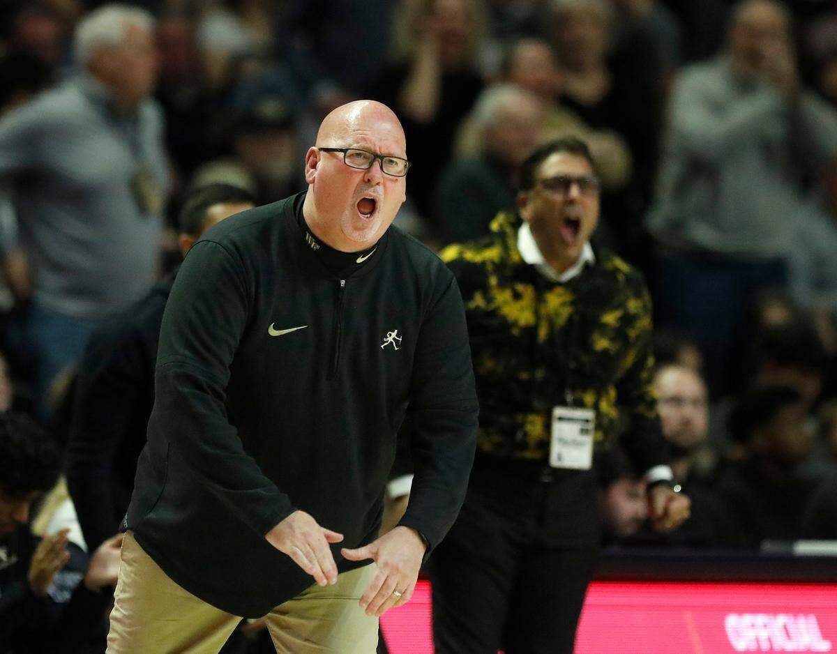 Wake Forest head coach Steve Forbes gives instructions from the sidelines during the second half of the Demon Deacons’ 83-79 win over N.C. State on Saturday, Feb. 10, 2024, at Lawrence Joel Veterans Memorial Coliseum in Winston-Salem, N.C.