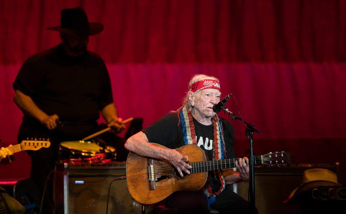 Willie Nelson launches into “Whiskey River” on his Outlaw Music Festival tour stop at Raleigh, N.C.’s Coastal Credit Union Music Park, Friday night, Sept. 8, 2023.