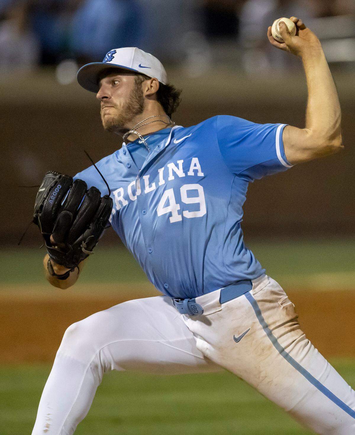 North Carolina pitcher Dalton Pence (49) delivers the final pitch of the game to LSU’s Josh Pearson, who flied out, securing the Tar Heels’ 4-3 victory in the tenth inning and winning the NCAA Regional on Monday, June 3, 2024 at Boshamer Stadium in Chapel Hill, N.C.