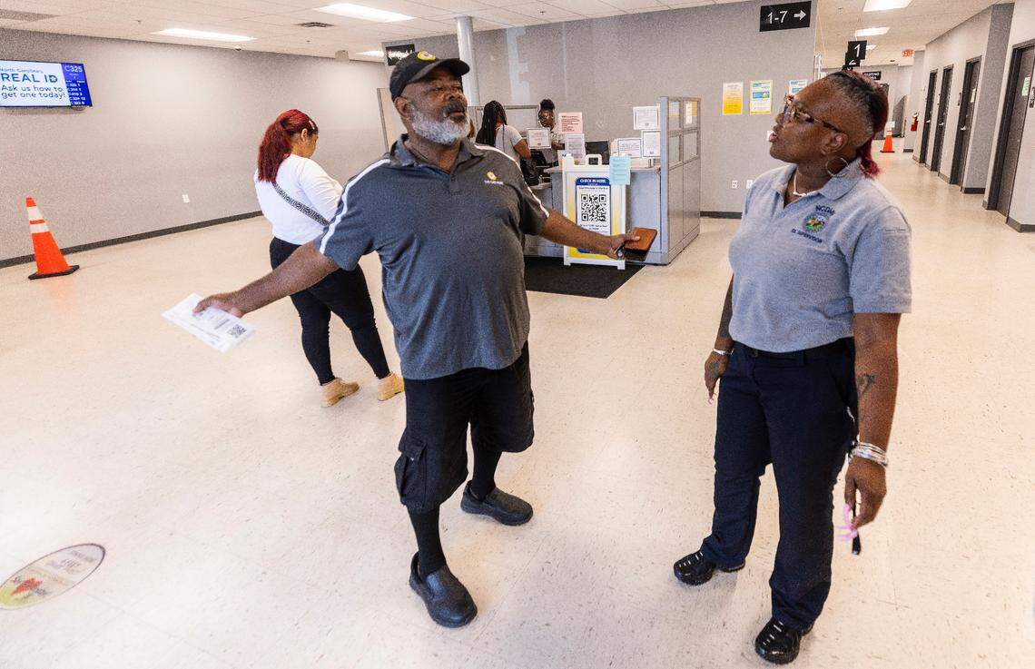 Sidney Tindall Jr.’s talks with supervisor Tanika Williams at the NCDMV driver license office on New Bern Avenue in Raleigh on Thursday, August. 29, 2024. As the state’s population grew by 2.4 million since 2003, the number of approved driver’s license examiners hasn’t changed, the Division of Motor Vehicles says.