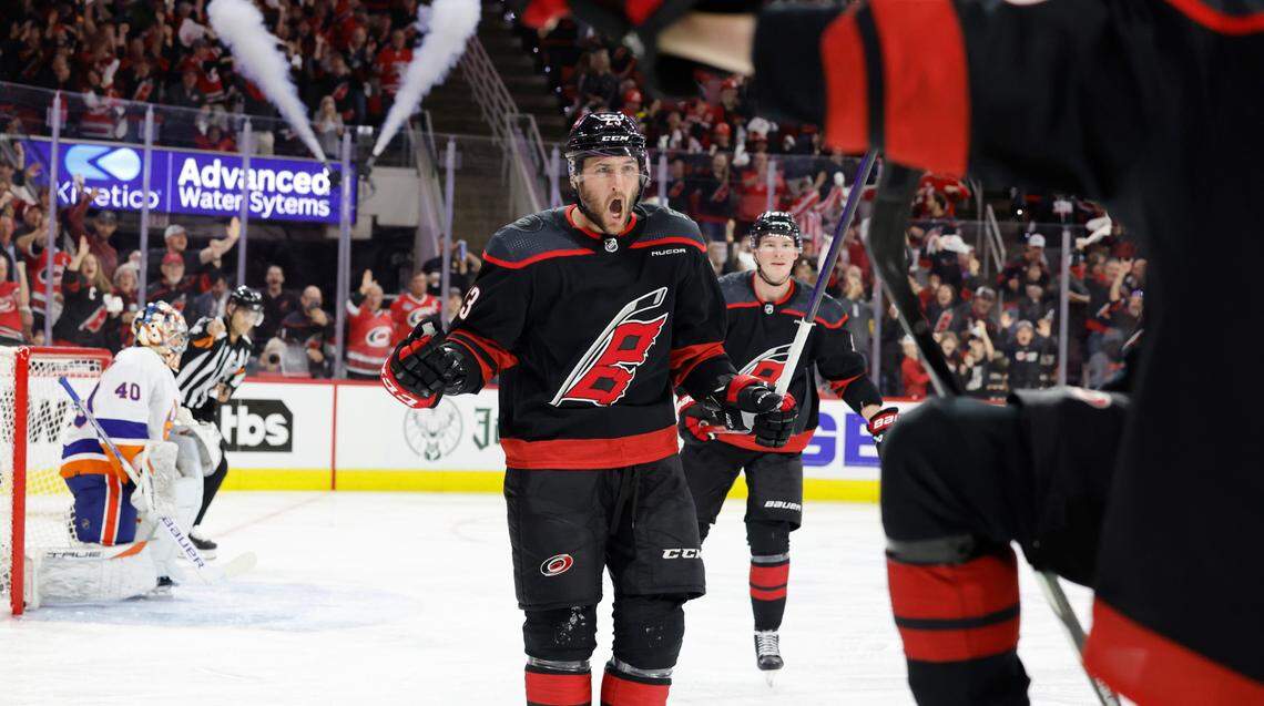 Carolina right wing Stefan Noesen (23) celebrates after Evgeny Kuznetsov scored during the first period of the Hurricanes game against the Islanders in the first round of the Stanley Cup playoffs at PNC Arena in Raleigh, N.C., Saturday, April 20, 2024.