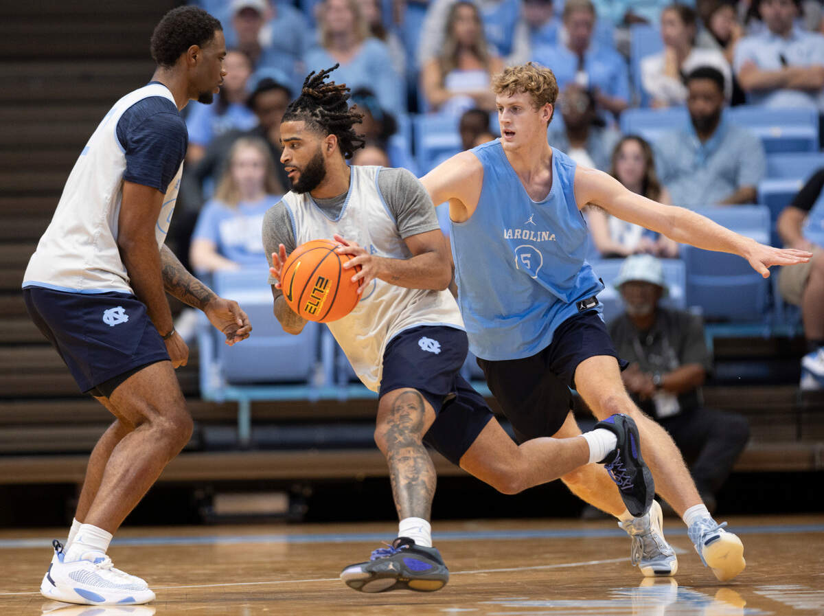 North Carolina’s R.J. Davis (4) gets a screen from Ty Claude (0) in the first half during the Tar Heels’ Blue vs. White scrimmage on Saturday, October 12, 2024 at the Smith Center in Chapel Hill, N.C.