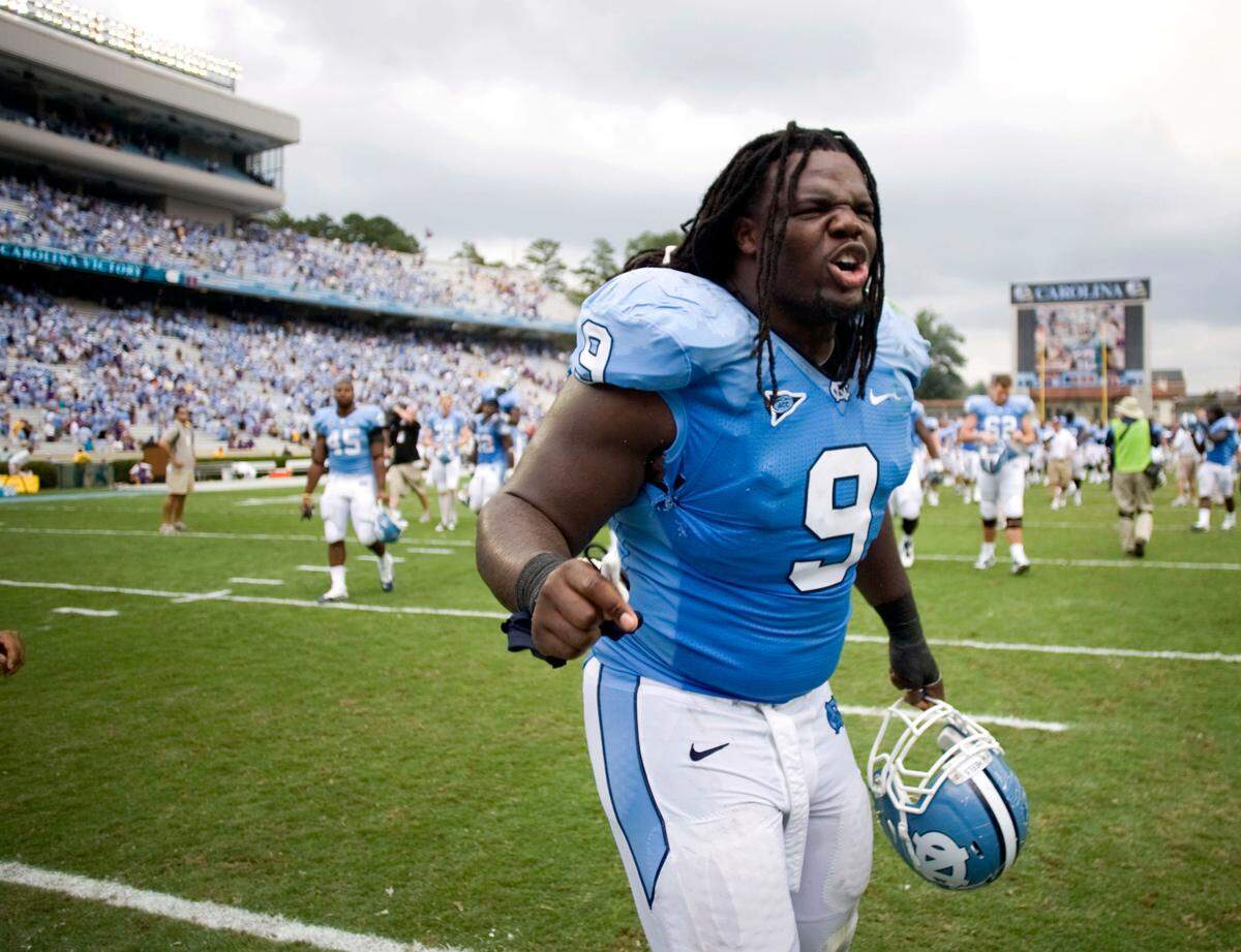 UNC defensive tackle Marvin Austin (9) celebrates a victory over East Carolina in 2009.