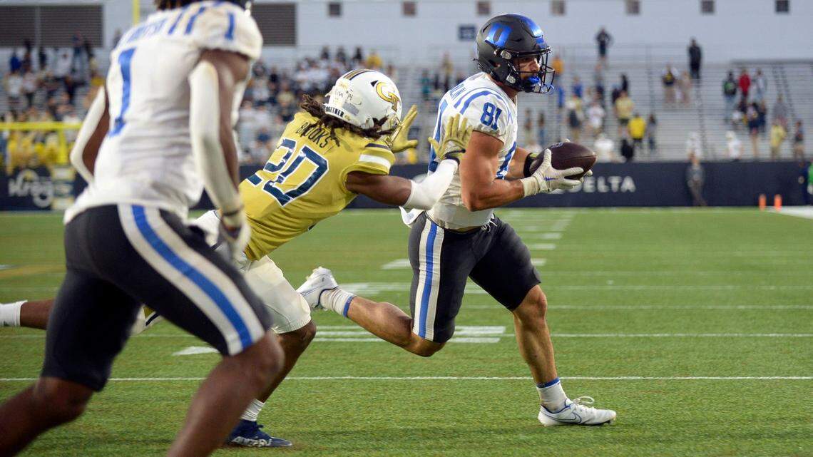 Duke tight end Nicky Dalmolin (81) carries the ball into the end zone tying the score to 20-20 with 8-seconds to play in the fourth quarter of an NCAA college football game against Georgia Tech, Saturday, Oct. 8, 2022, at Bobby Dodd Stadium, in Atlanta. (Daniel Varnado/Atlanta Journal-Constitution via AP)
