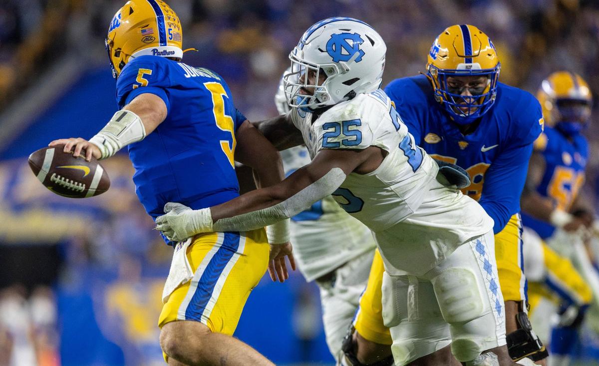 Pitt quarterback Phil Jurkovec (5) is sacked for a 21-yard loss by North Carolina’s Kaimon Rucker in the second quarter on Saturday, September 23, 2023 at Acrisure Stadium in Pittsburgh, Pa.