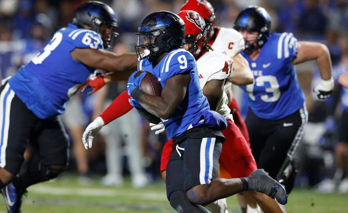 Duke running back Jaquez Moore (9) gains yards during the first half of N.C. State’s game against Duke at Wallace Wade Stadium in Durham, N.C., Saturday, Oct. 14, 2023.