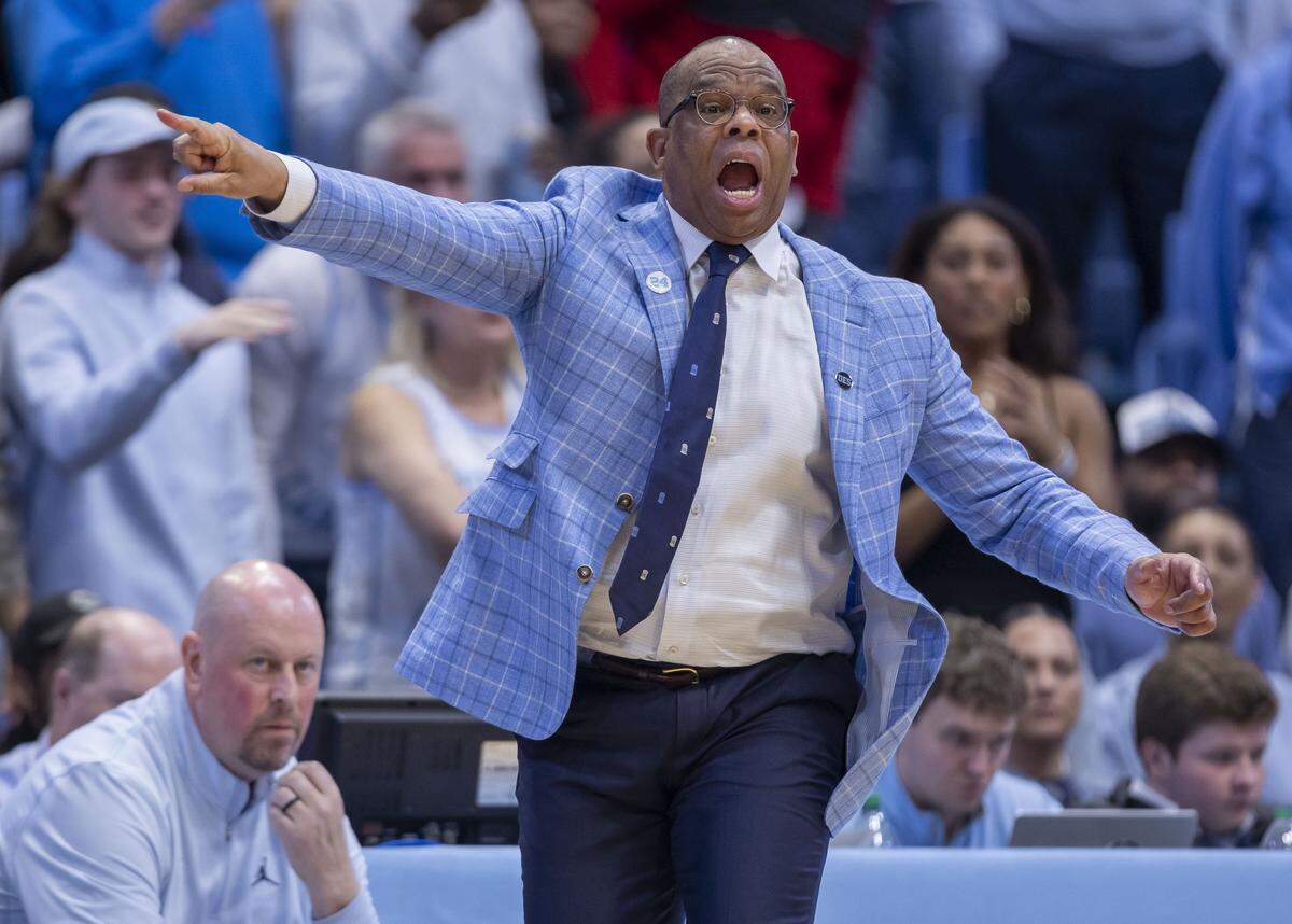 North Carolina coach Hubert Davis directs his players on offense late in a close game against Clemson on Tuesday, March 3, 2026 at the Smith Center in Chapel Hill, N.C.