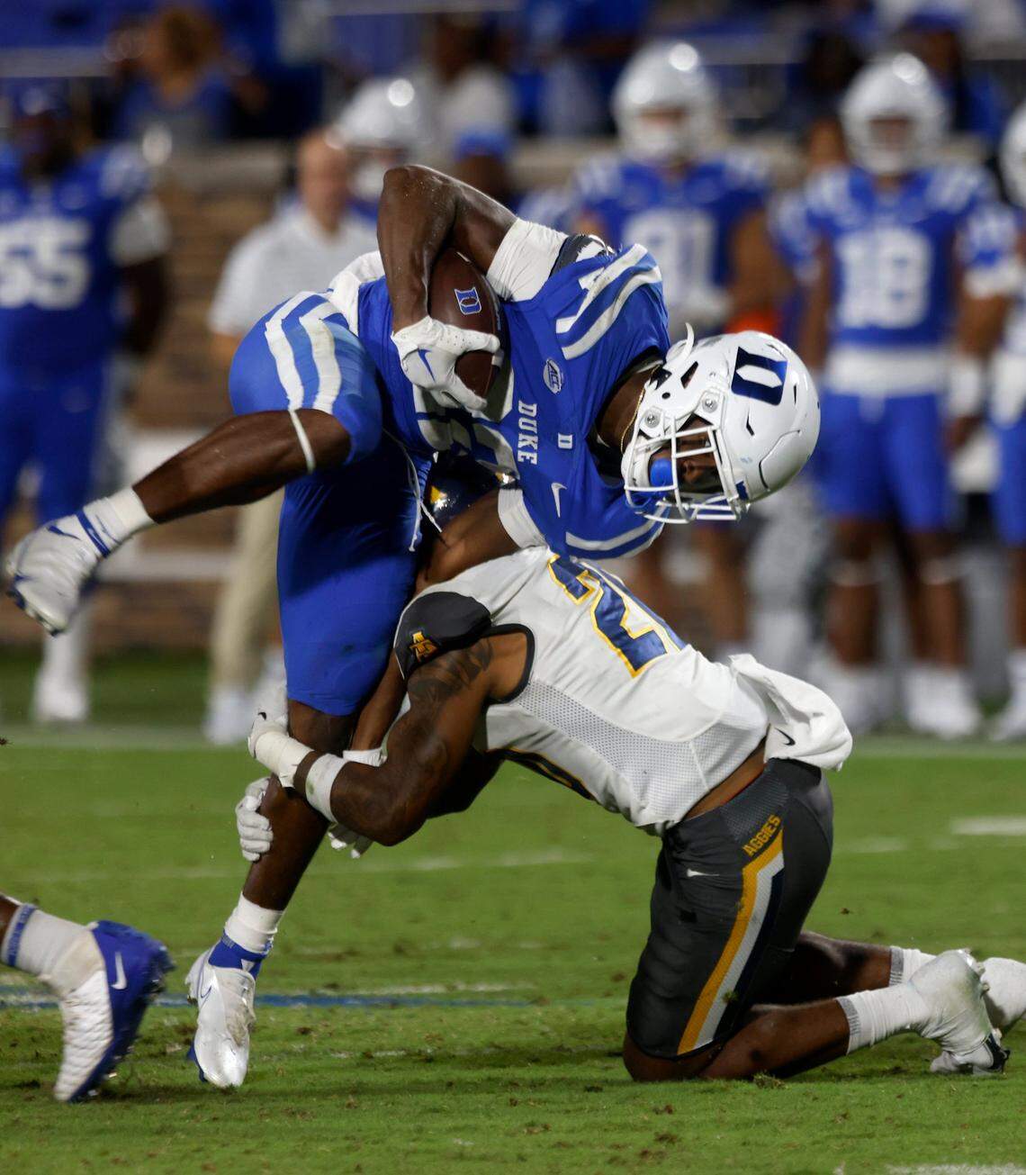 Duke Blue Devils running back Jaylen Coleman is brought down by North Carolina A&T Aggies defensive back Avarion Cole during the second half of Dukes game against North Carolina A&T at Wallace Wade Stadium in Durham, N.C. on Saturday, Sept. 17, 2022.