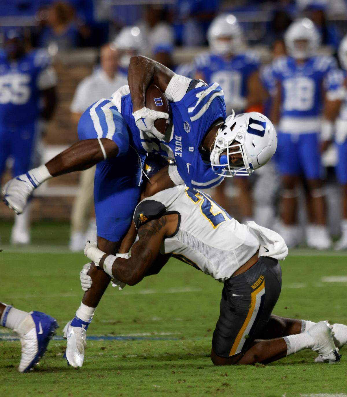 Duke Blue Devils running back Jaylen Coleman is brought down by North Carolina A&T Aggies defensive back Avarion Cole during the second half of Dukes game against North Carolina A&T at Wallace Wade Stadium in Durham, N.C. on Saturday, Sept. 17, 2022.