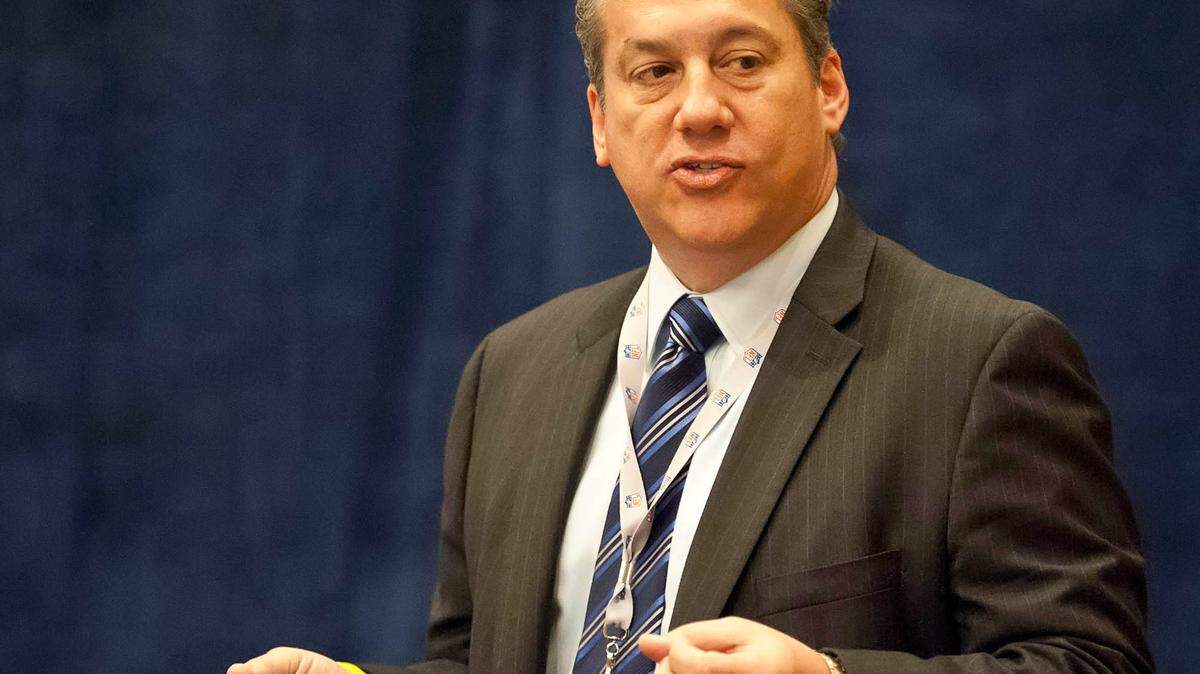 NFL senior director of officiating Alberto Riveron speaks during a press conference at the annual NFL meetings at the Arizona Biltmore.