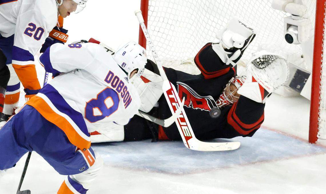 Carolina goaltender Frederik Andersen (31) makes the save on the shot by New York defenseman Noah Dobson (8) during the third period of the Hurricanes 3-1 victory over the Islanders in the first round of the Stanley Cup playoffs at PNC Arena in Raleigh, N.C., Saturday, April 20, 2024.