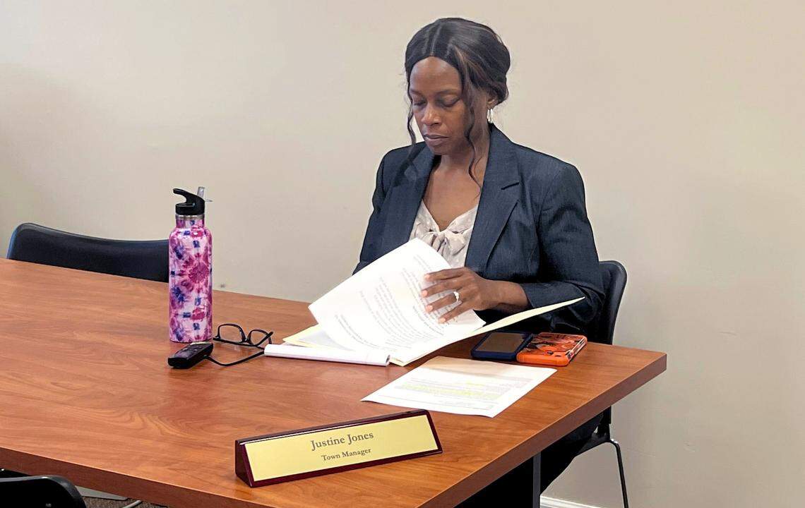 Kenly town manager Justine Jones prepares for a Town Council emergency session in Kenly N.C., Friday, July 22, 2022. The session is in response to the abrupt resignation of the police chief, four officers, and two administrators.
