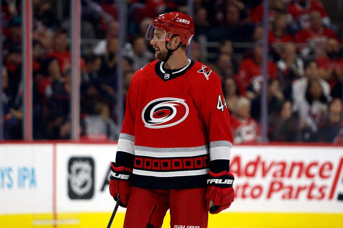 Carolina Hurricanes’ Calvin de Haan (44) waits for a face-off against the Columbus Blue Jackets during the second period of an NHL hockey game in Raleigh, N.C., Wednesday, Oct. 12, 2022. (AP Photo/Karl B DeBlaker)