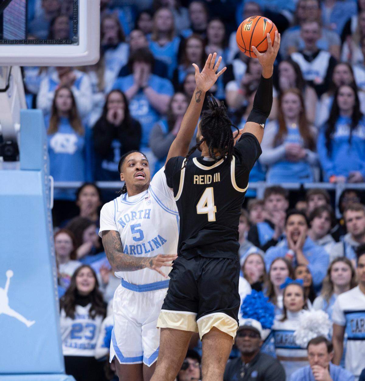 North Carolina’s Armando Bacot (5) defends Wake Forest’s Efton Reid III (4) in the first half on Monday, January 22, 2024 at the Smith Center in Chapel Hill, N.C.