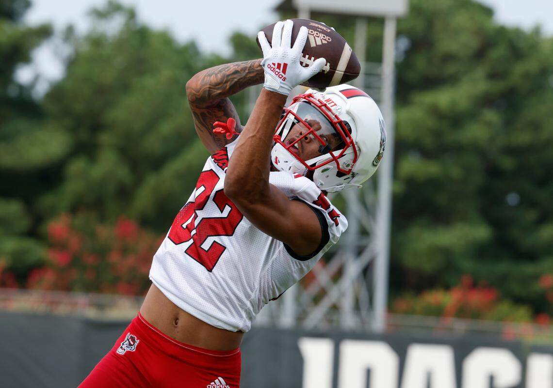 N.C. State wide receiver Terrell Timmons Jr. (82) pulls in the pass during the Wolfpack’s first fall practice in Raleigh, N.C., Wednesday, August 2, 2023.
