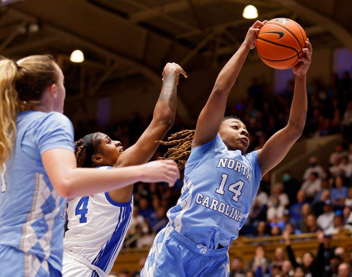 North Carolina’s Kayla McPherson grabs a rebound away from Duke’s Elizabeth Balogun during the first half of the Tar Heels’ 45-41 win over Duke on Sunday, Feb. 26, 2023, at Cameron Indoor Stadium in Durham, N.C.