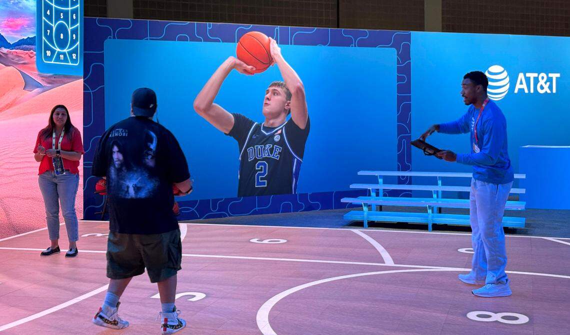A photo of DukeÕs Cooper Flagg adorns the wall at AT&TÕs interactive game at the MenÕs Final Four Fan Fest in San Antonio, Texas, Thursday, April 3, 2025.