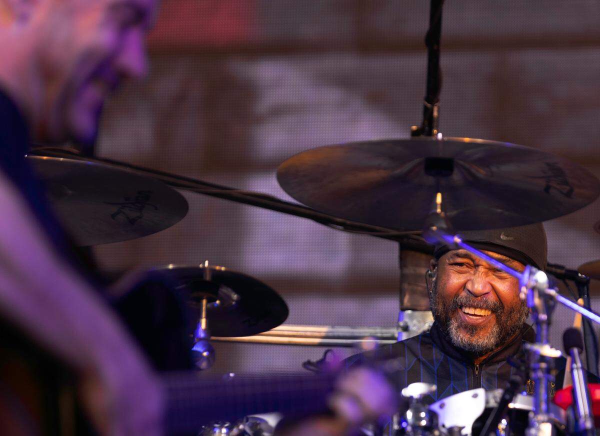The Dave Matthews Band drummer Carter Beauford smiles at Dave Matthews as DMB starts their show at Raleigh, N.C.’s Coastal Credit Union at Walnut Creek, Friday night, June 14, 2024.