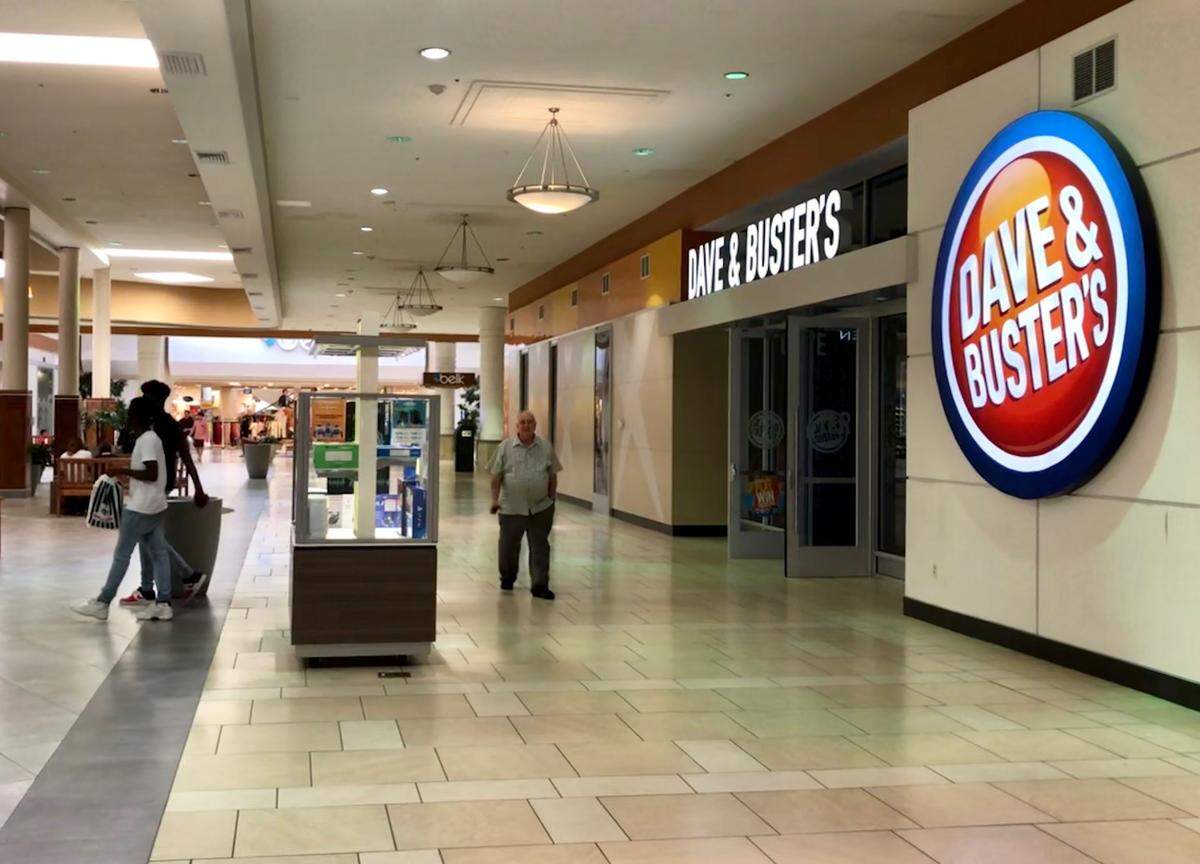 The entrance to the Dave & Buster’s inside of Cary Towne Center mall on Wednesday, July 24.