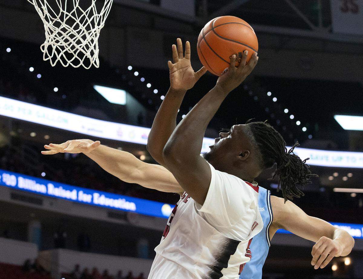 N.C. State’s DJ Burns Jr. puts up a shot during the second half of the Wolfpack’s season opener against the Citadel on Monday, Nov. 6, 2023, at PNC Arena in Raleigh, N.C.