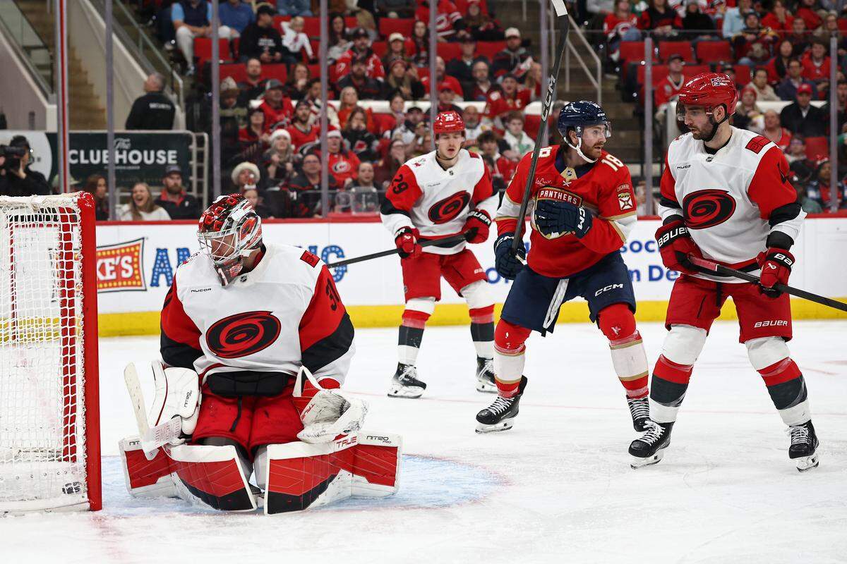 Hurricanes goalie Frederik Andersen looks at the puck in the net following a goal by Sam Bennett of the Florida Panthers during the third period at Lenovo Center on Dec. 23, 2025 in Raleigh, North Carolina.