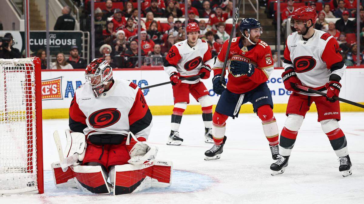 Hurricanes goalie Frederik Andersen looks at the puck in the net following a goal by Sam Bennett of the Florida Panthers during the third period at Lenovo Center on Dec. 23, 2025 in Raleigh, North Carolina.