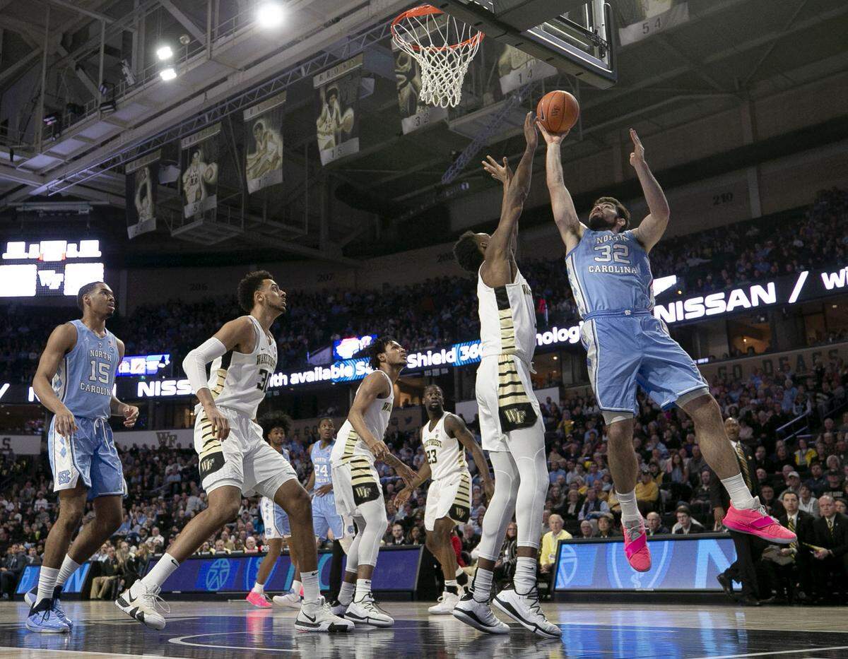 North Carolina’s Luke Maye (32) puts up a shot over Wake Forest’s Isaiah Muciusc( 1) during the first half on Saturday, February 16, 2019 at Lawrence Joel Coliseum in Winston-Salem, N.C.