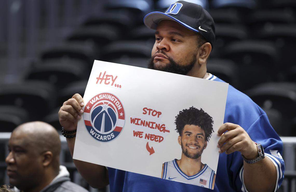 A fan displays his sign during Duke basketball’s open practice during ESPN’s College GameDay at Capital One Arena in Washington, D.C., Saturday, Feb. 21, 2026.