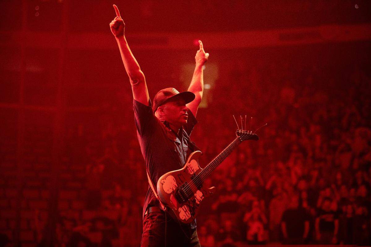 Tom Morello works the crowd into a frenzy as Rage Against the Machine plays Raleigh’s PNC Arena, Sunday night, July 31, 2022.