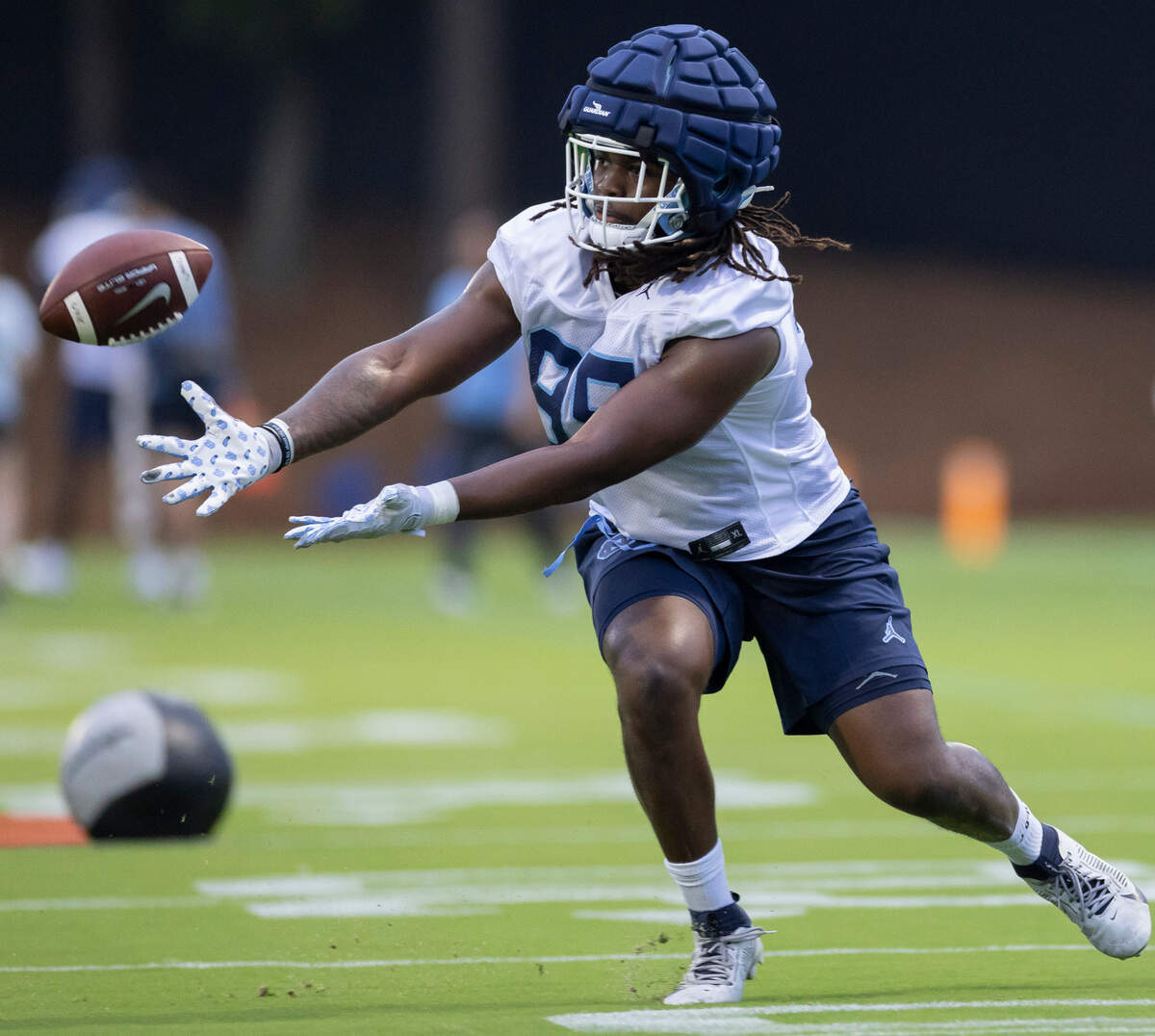 North Carolina freshman Daniel Anderson (95) works through a ball handling drill during the Tar Heels’ first practice of the season on Monday, July 29, 2024 in Chapel Hill, N.C.