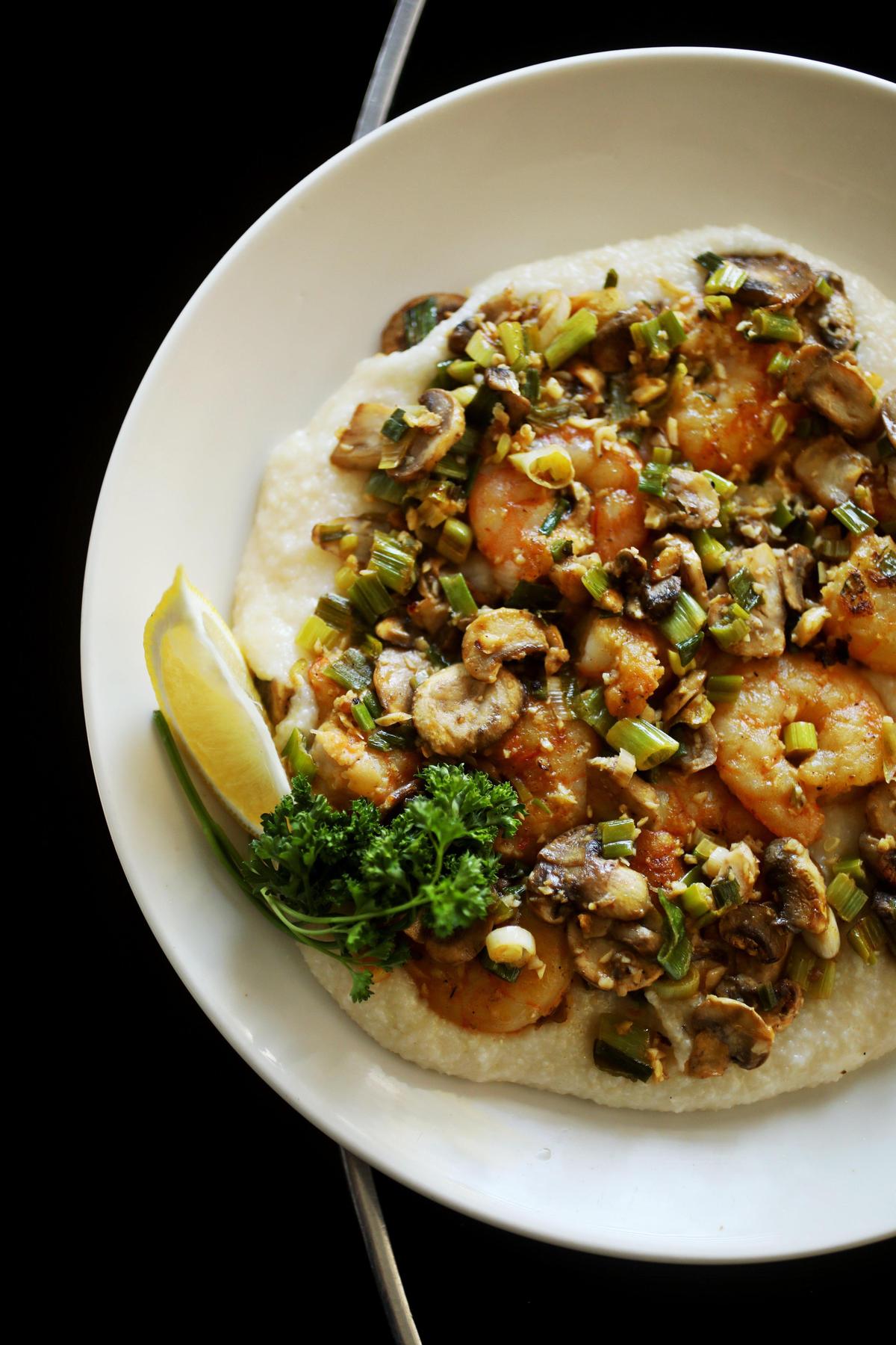 Crook’s Corner’s iconic shrimp and grits — a beautifully balanced presentation featuring plump and peppery shellfish, sautéed mushrooms, bacon and scallions over cheese grits. The Chapel Hill restaurant has made significant contributions to the local dining scene and won the James Beard Foundation’s American Classics award in 2011, given to “our nation’s beloved regional restaurants.”