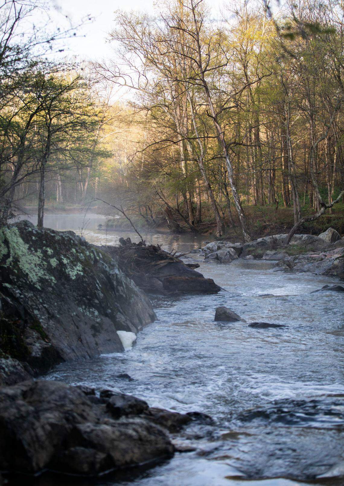 The Buckquarter Creek Trail at Durham, N.C.’s Eno State Park takes patrons past rocky areas in the Eno River, pictured here on Friday, April 8, 2022.