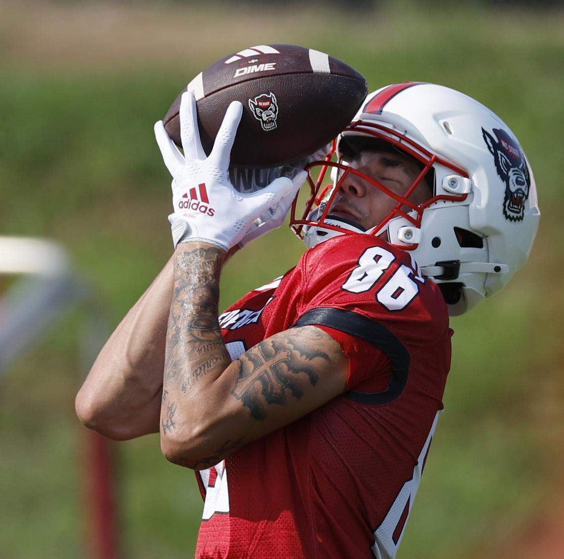 N.C. State wide receiver Elijah Tillery (86) pulls in a pass during the Wolfpack’s first practice in Raleigh, N.C., Wednesday, July 31, 2024.