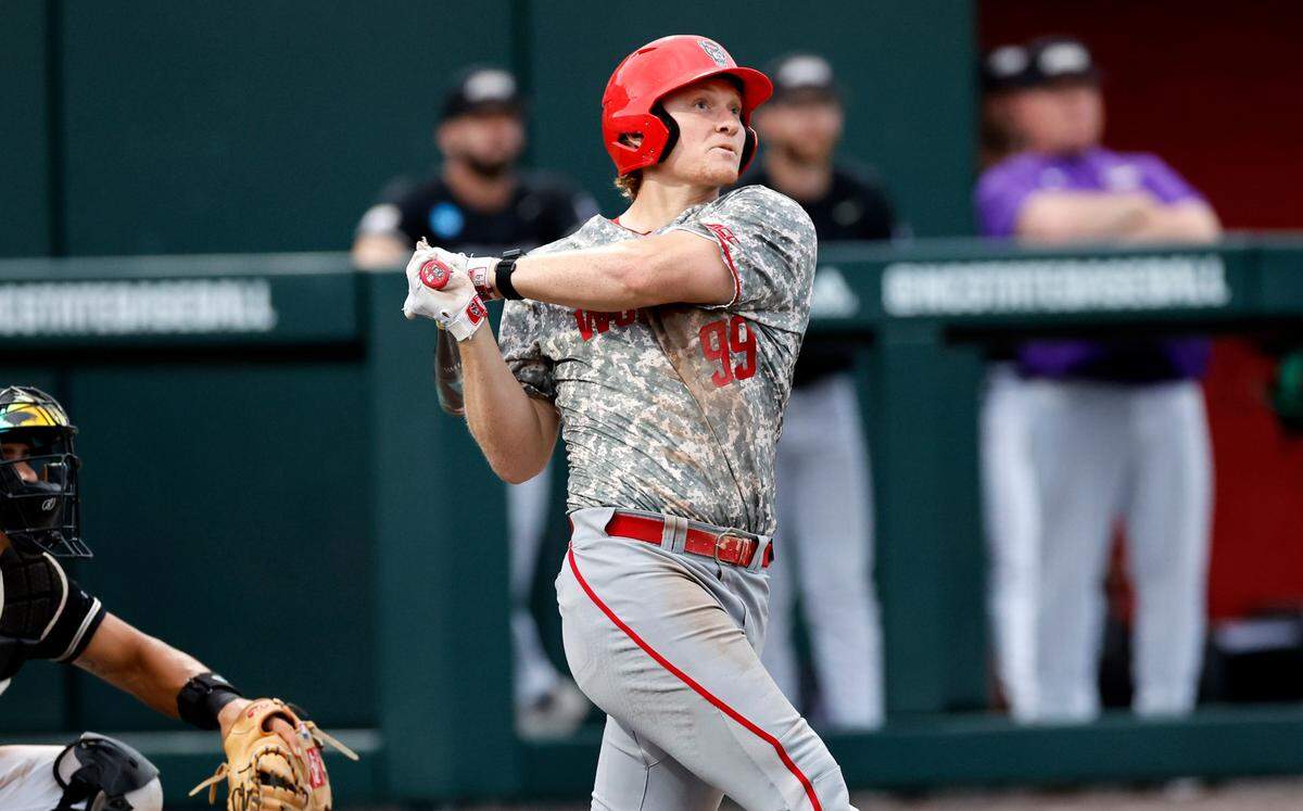 N.C. State’s Alec Makarewicz (99) watches his home run in the sixth inning during N.C. State’s game against James Madison in the NCAA Raleigh Regional final at Doak Field Sunday, June 2, 2024.