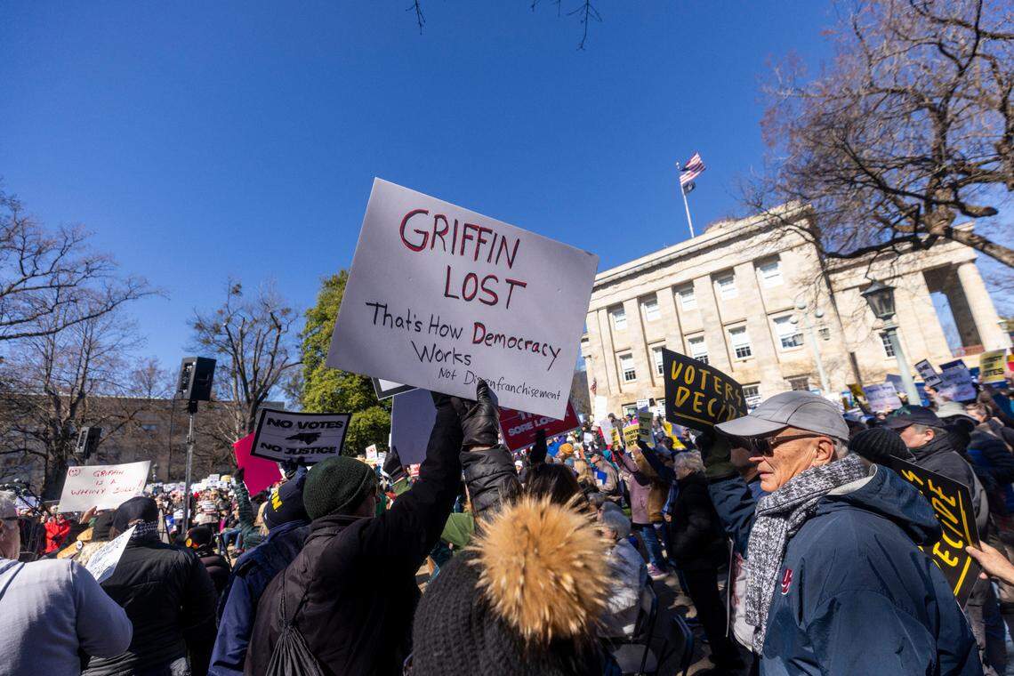 Hundreds of demonstrators rally at the North Carolina State Capitol on Monday. The rally, organized by Common Cause, protested Republican state Supreme Court candidate Jefferson Griffin’s challenge of 65,000 ballots in November’s election. He trails Democratic incumbent Justice Allison Riggs.